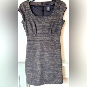 Like New! Wore it once at a wedding. Color Black with gold prints.